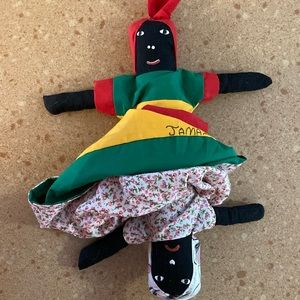 Jamaican cultural colorful Tospsy-Turvy doll. Beautifully sewn two in one